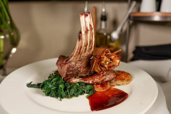 L’Opera Ristorante signature dishes Rack of Lamb, Bruschetta, Cappellacci Di Zucca.